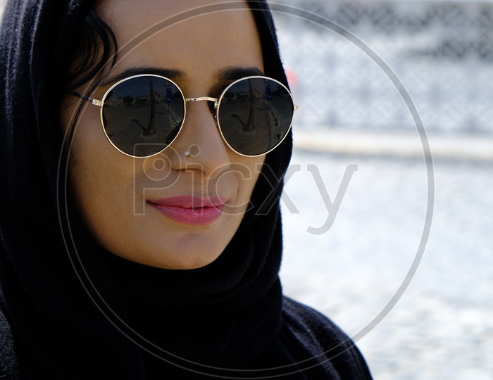 Lady tourist watching Katara Cultural Village