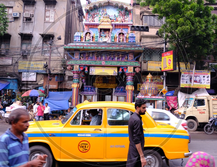 Sri Sri Nagreswar Mahadev Mandir Hindu Temple with iconic Ambassador Kolkatta Taxi in foreground