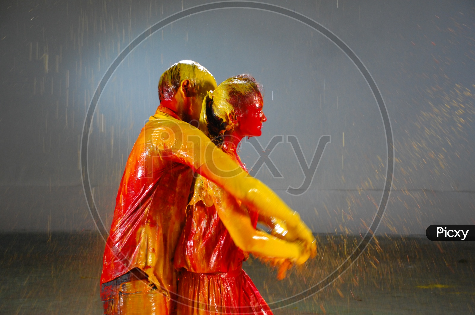 Young Indian Couple Playing with Colors