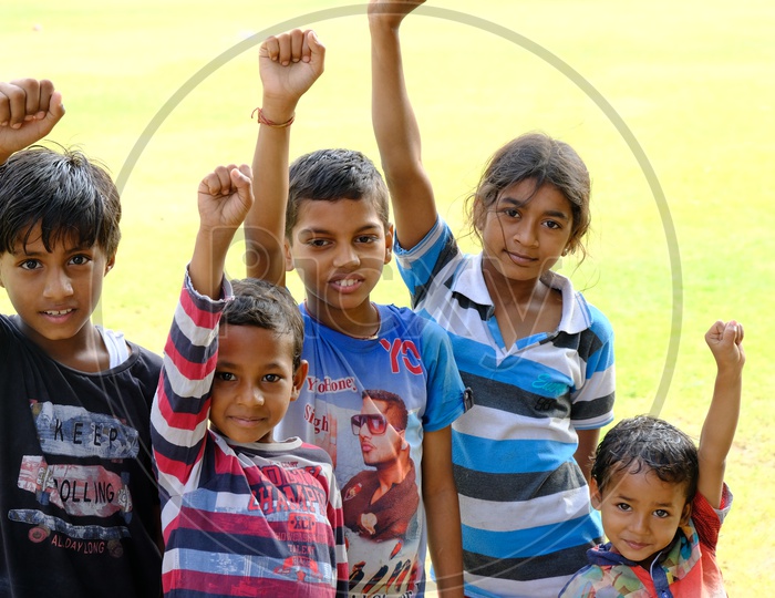 Indian  Children As a group With Smile Faces in  a Lawn Garden