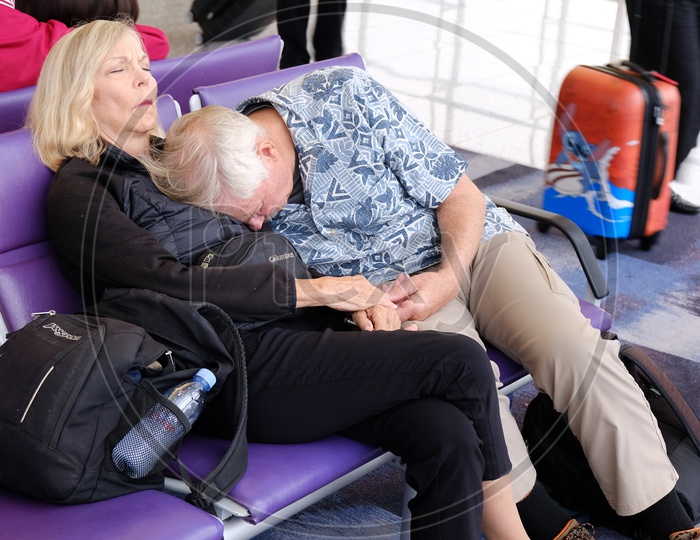 Old age Couple sleeping in Hualien Airport