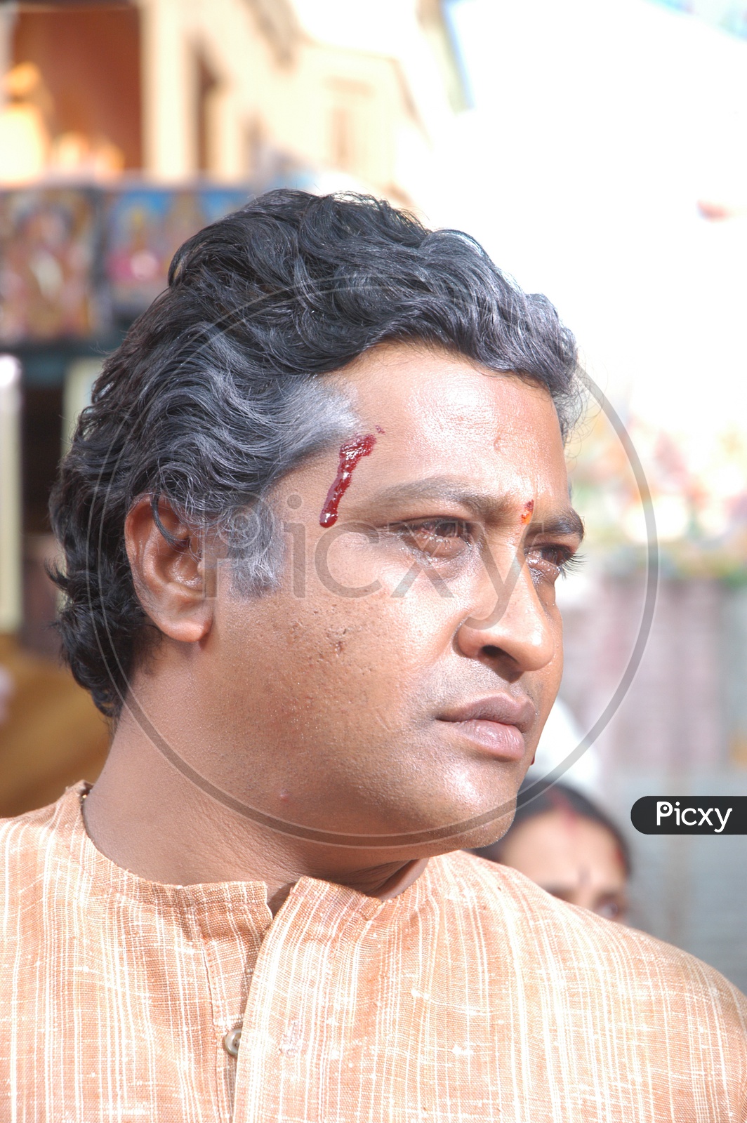 Indian Man With Blood Stains on Face