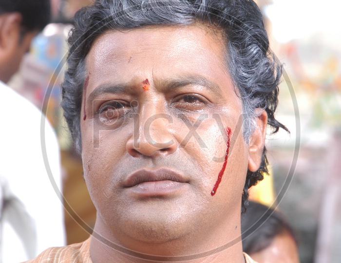 Indian Man With Blood Stains on Face