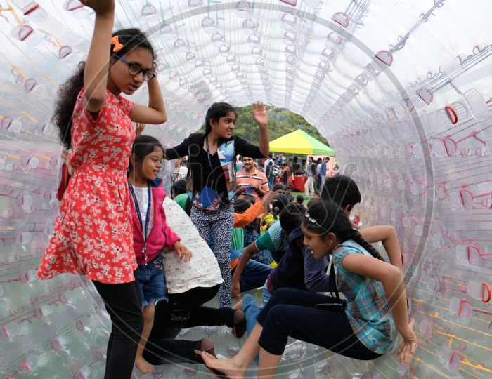 Children In a Bubble roller Ball in a Amusement Park