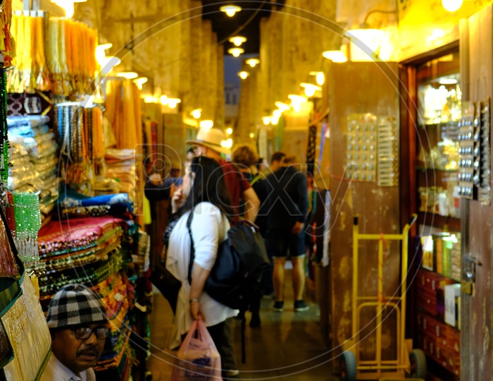 Tourists Shopping in the Narrow Streets in Doha, Qatar
