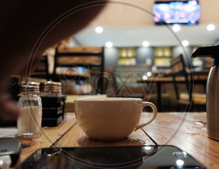 Coffee Tea Cup on a Coffee Shop Table