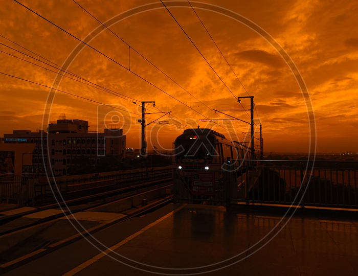 Photo Of a Metro Rail During Sunset