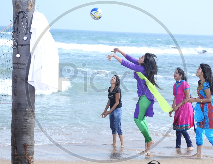 Indian Girls Playing Beach Volleyball