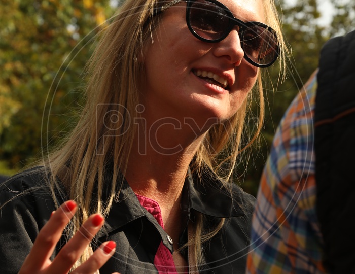 A Woman Happily smiling