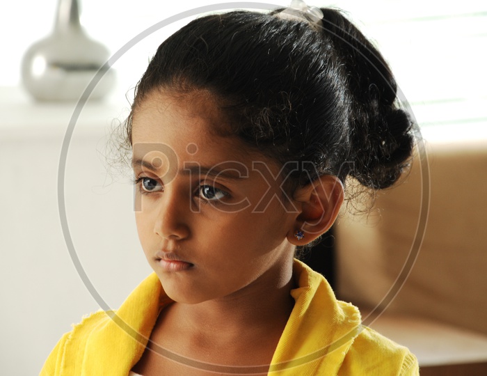 Indian Girl Child with an Expression On Face