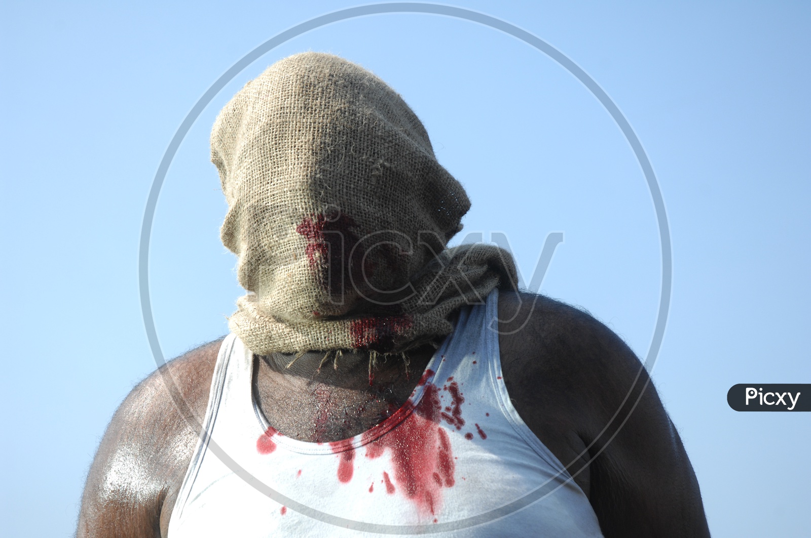 A Man Face Covered With Gunny Bag Mask And Beaten To Blood
