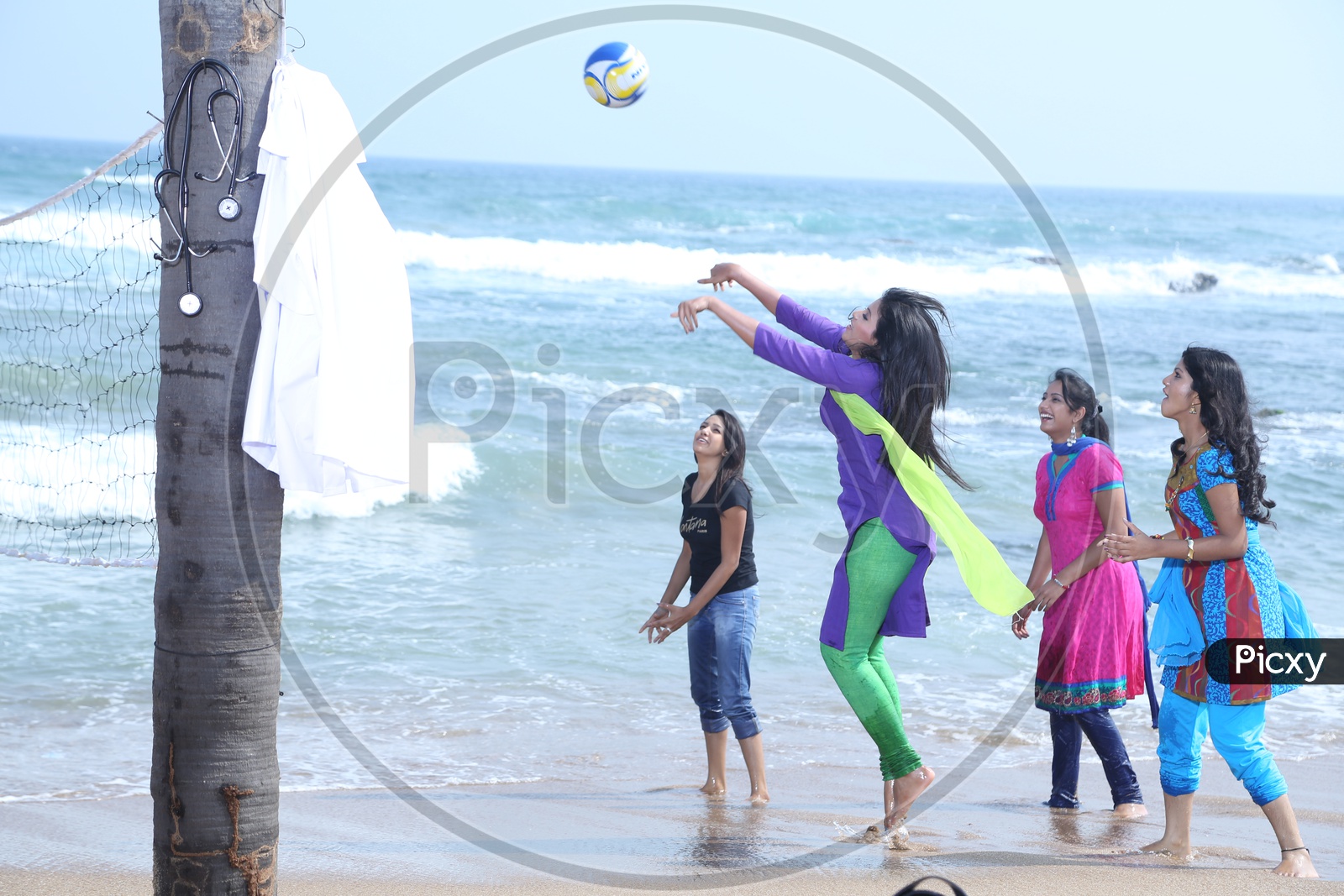 Indian Girls Playing Beach Volleyball
