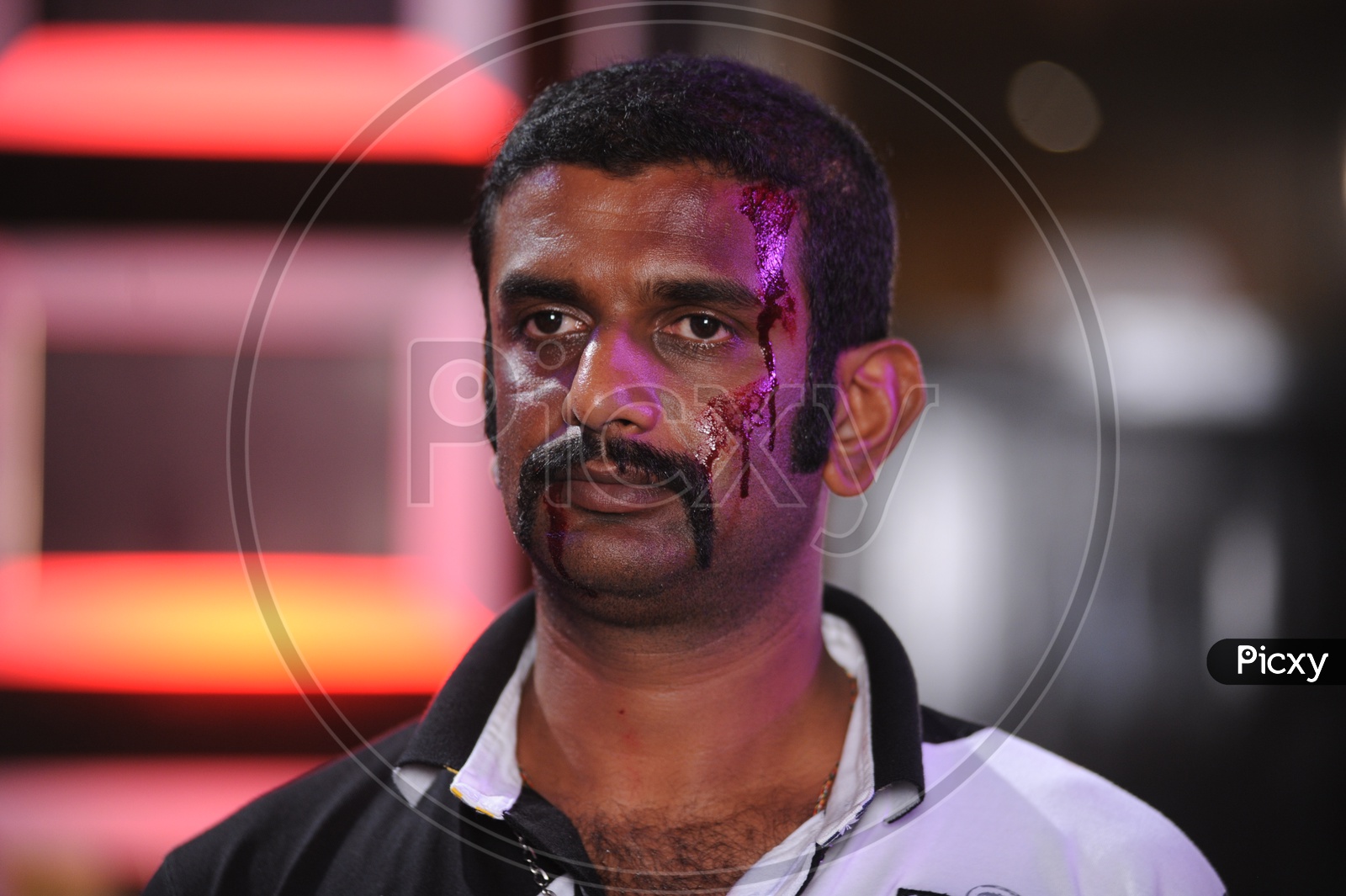 Image of A Man With Blood Stains On Face-BN803246-Picxy