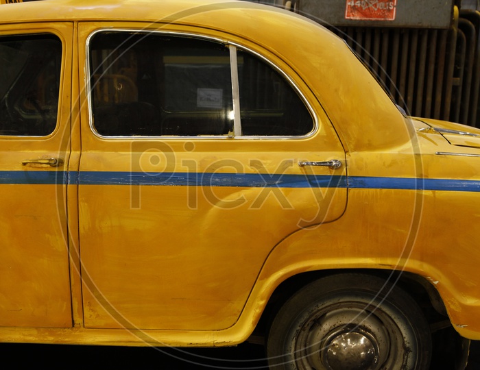 Yellow Ambassador car