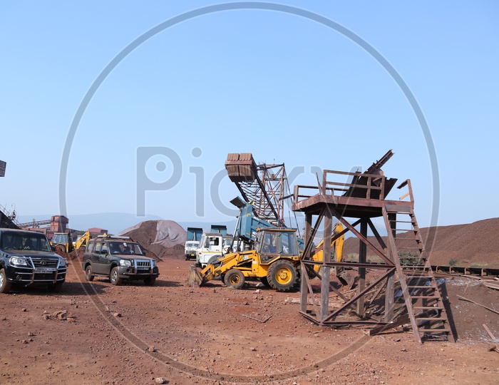 Cars And Trucks in a Coal Mine Quarry