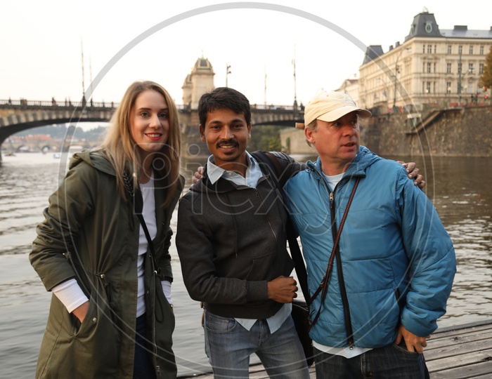 Indian Man Posing With  Foreigners