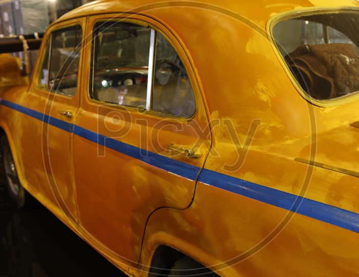 Yellow Ambassador car