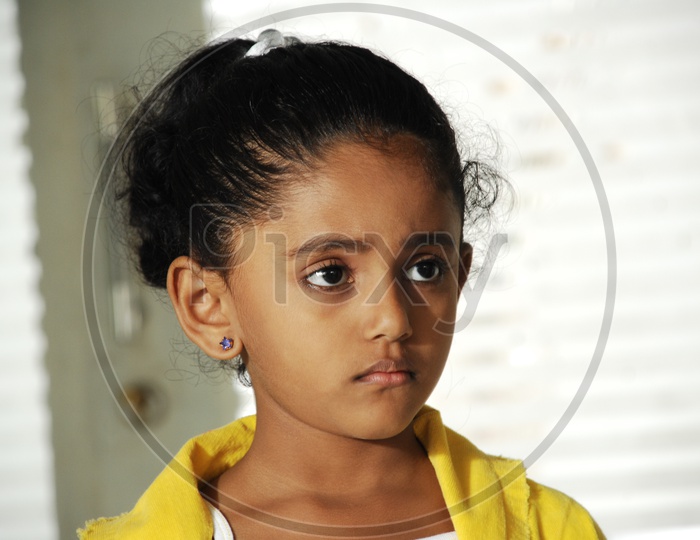 Indian Girl Child with an Expression On Face
