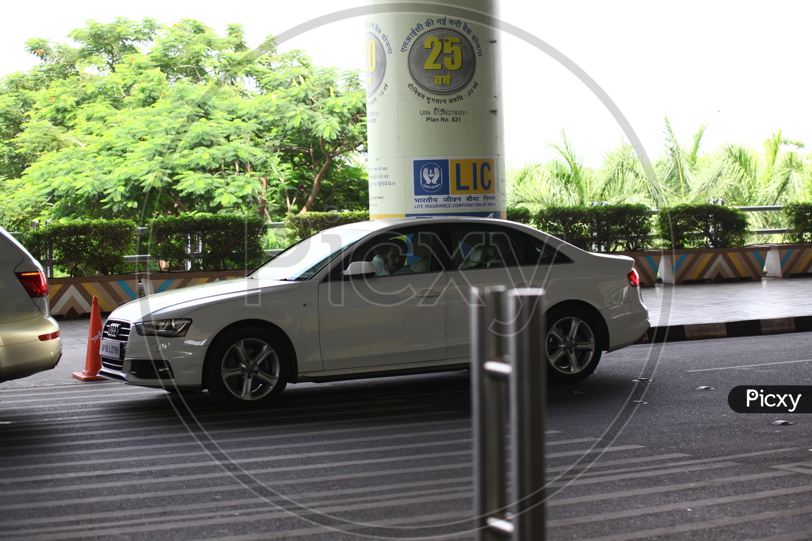 Car Parked At Airport Entrance