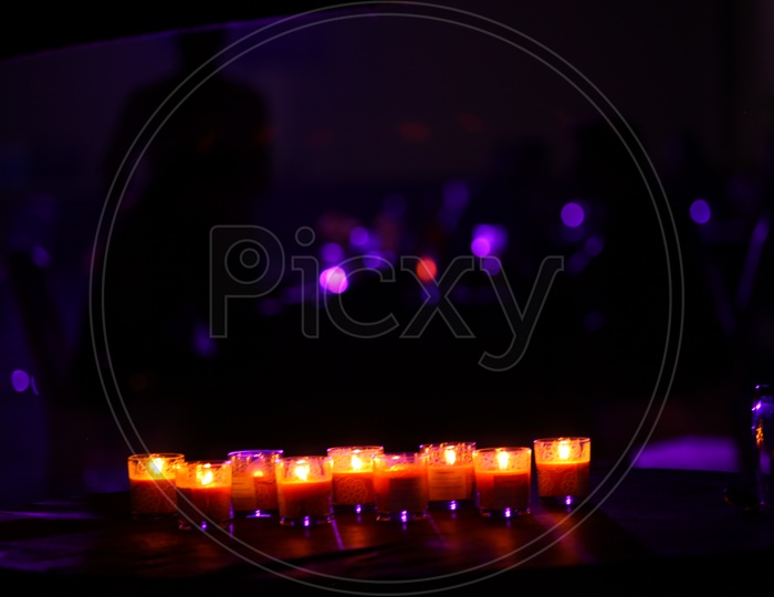 Scented Candles Lighted On a Dining Table