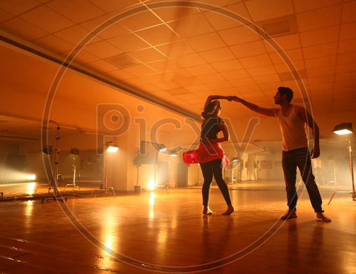 Young Dancers Couple  Practice on Floor
