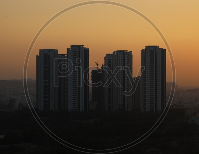 High Rise Apartments in Hyderabad with Sunset in Background