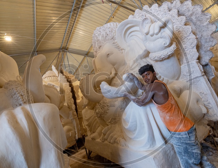 Ganesh Idol Making In Dhoolpet For Ganesh Festival By Artists Giving  Final Finishing   In Workshops