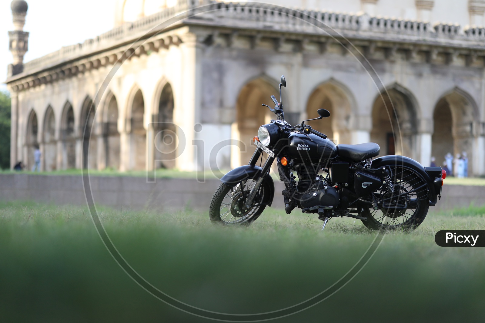 Royal Enfield Bike and Qutub Shahi Tombs in Background