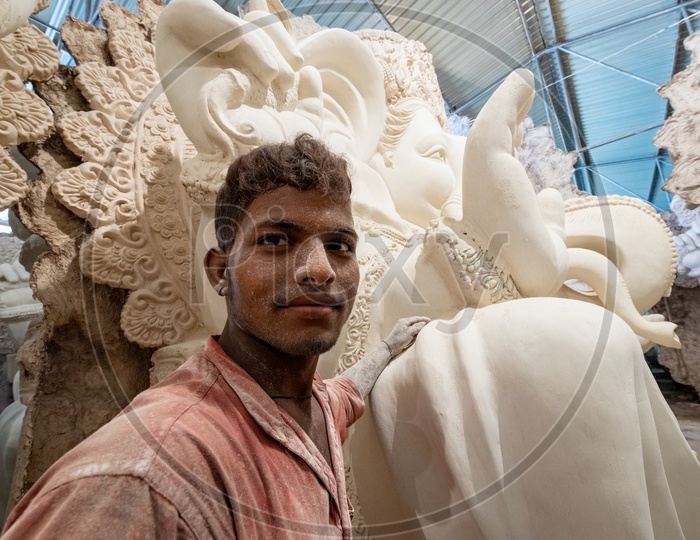 Ganesh Idols Making In Dhoolpet For Ganesh Chathurdhi Festival By Artists Giving Finishing To idols