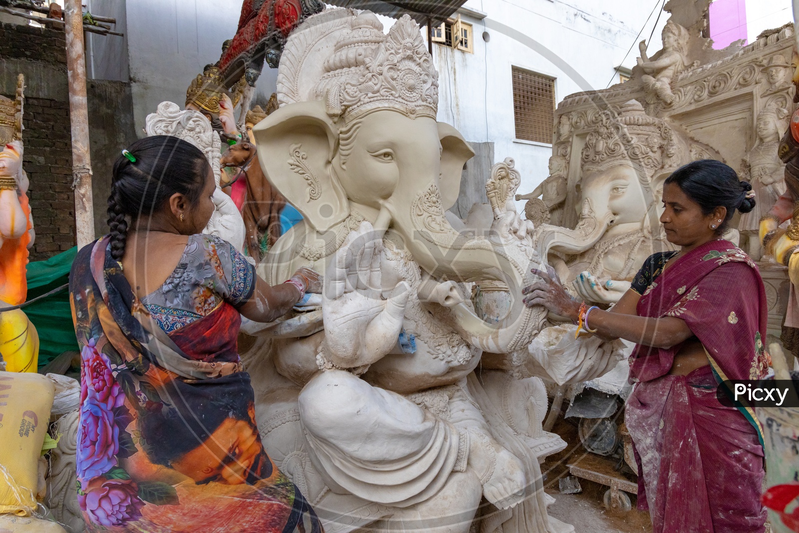 Ganesh Idol Making In Dhoolpet For Ganesh Festival By Artists In Workshops