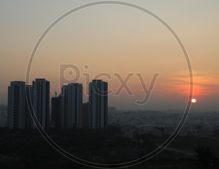 High Rise Apartments in Hyderabad with Sunset in Background