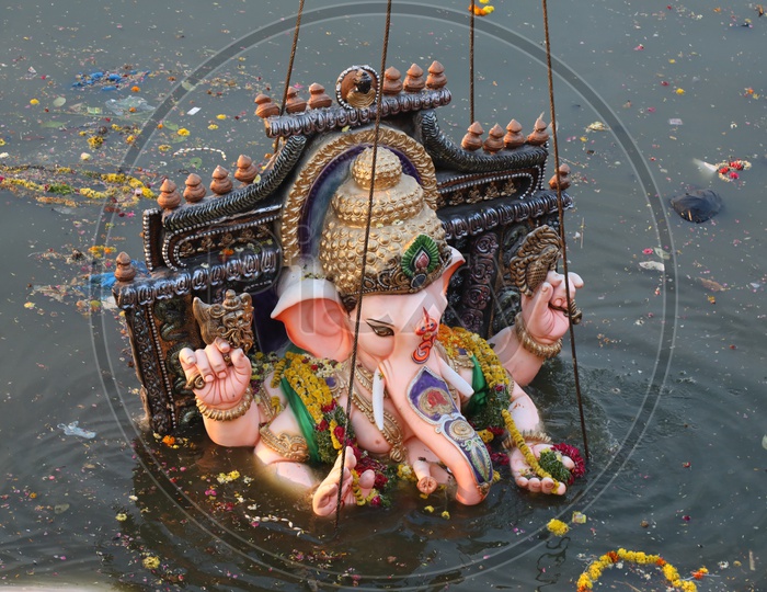 Ganesh Idols Visarjan Nimarjan With Heavy Cranes In Hussain sagar Lake At Tankbund  During Ganesh festival