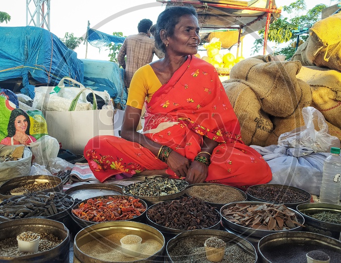 Woman selling spices