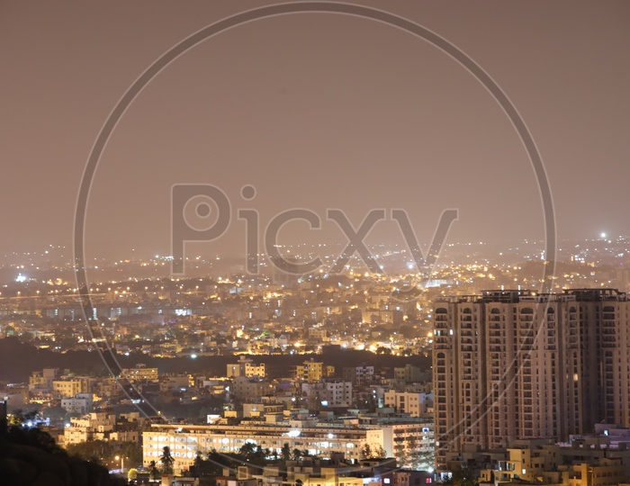 Night Scape Of City Lights With High rise  Buildings with Sheikpet and Tolichowki