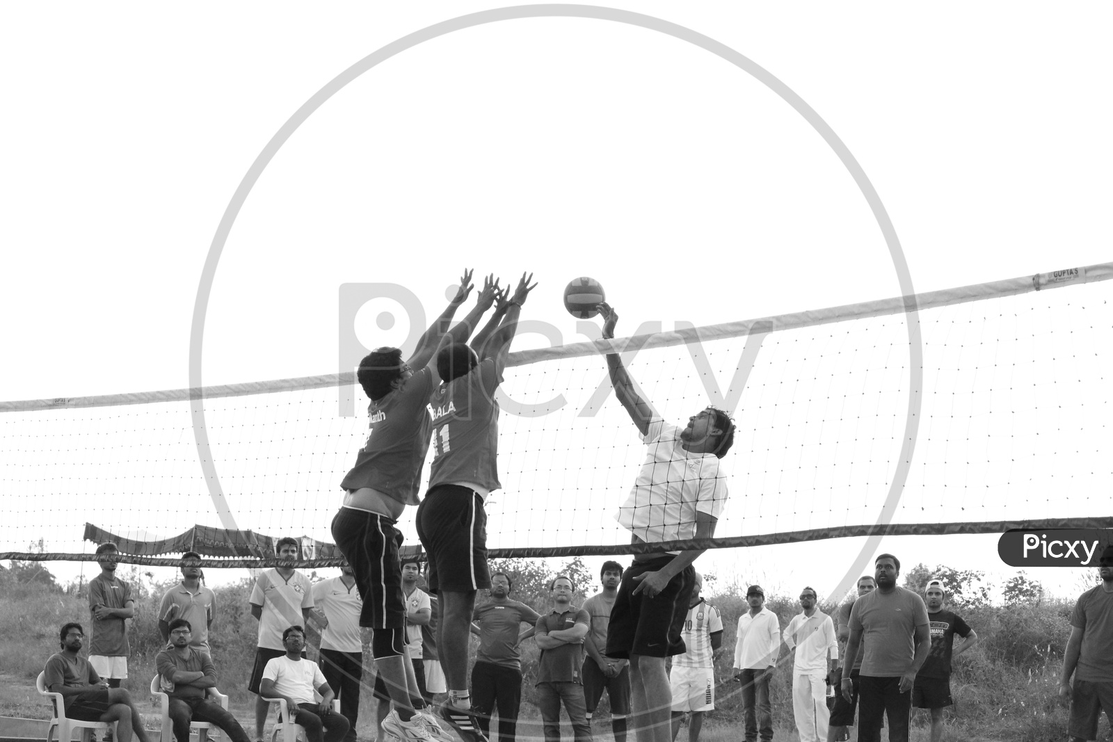 Image of Young Indian Men Playing Volleyball in IMT HyderabadVC524016