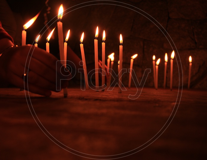Candles lit in a Church
