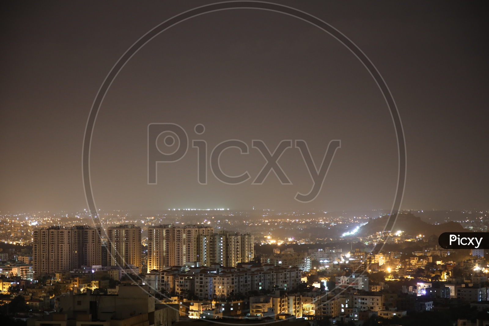 Night Scape Of City Lights With High rise  Buildings Aditya Hill Top