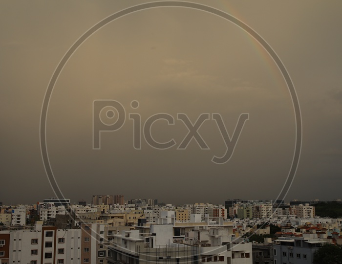 City Scape With high rise Buildings   With a Rainbow  over City Scape
