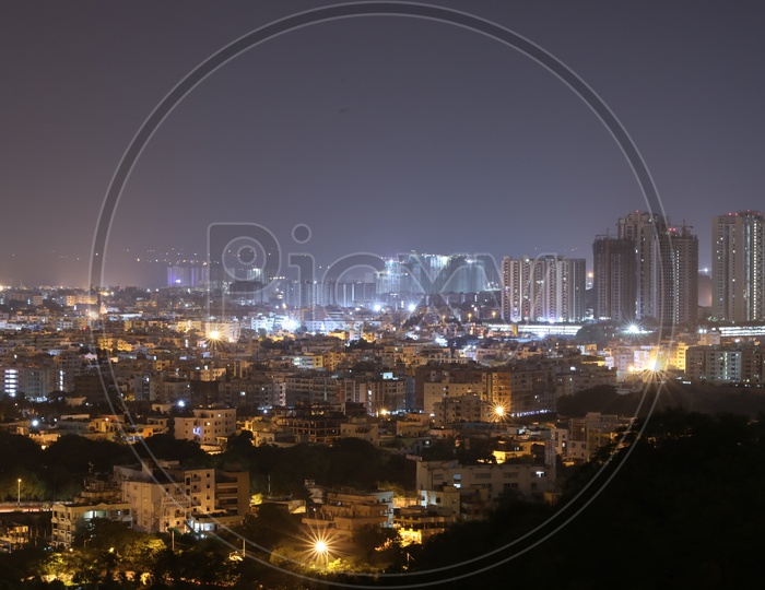 Night Scape Of City Lights With High rise  Buildings with Lancohills and my home avatar