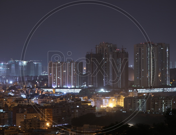 Night Scape Of City Lights With High rise  Buildings with Lancohills and my home avatar