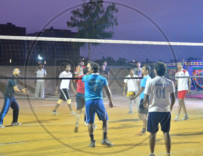Young Players Students Playing Volleyball  in a College Campus Competition