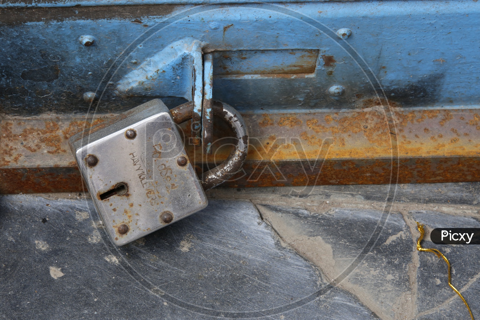 Image of Shop Shutter Locked With LockYC486392Picxy