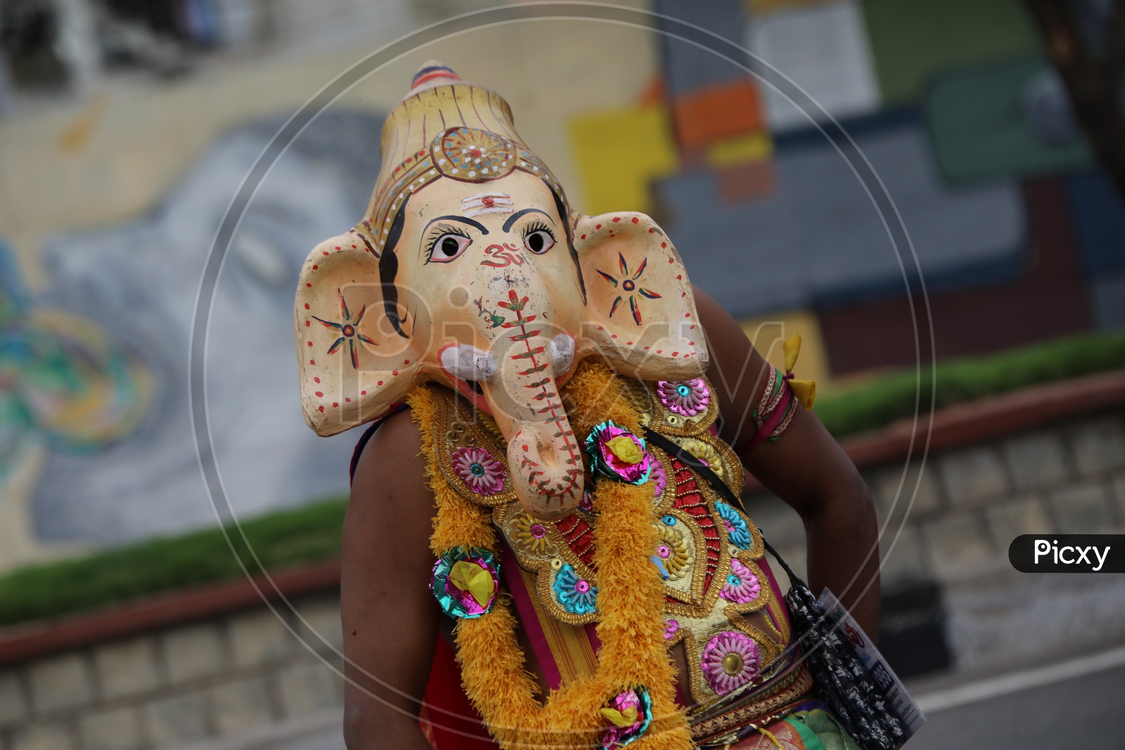 Street Actor  Artist Wearing Lord Ganesh Mask  on The Streets