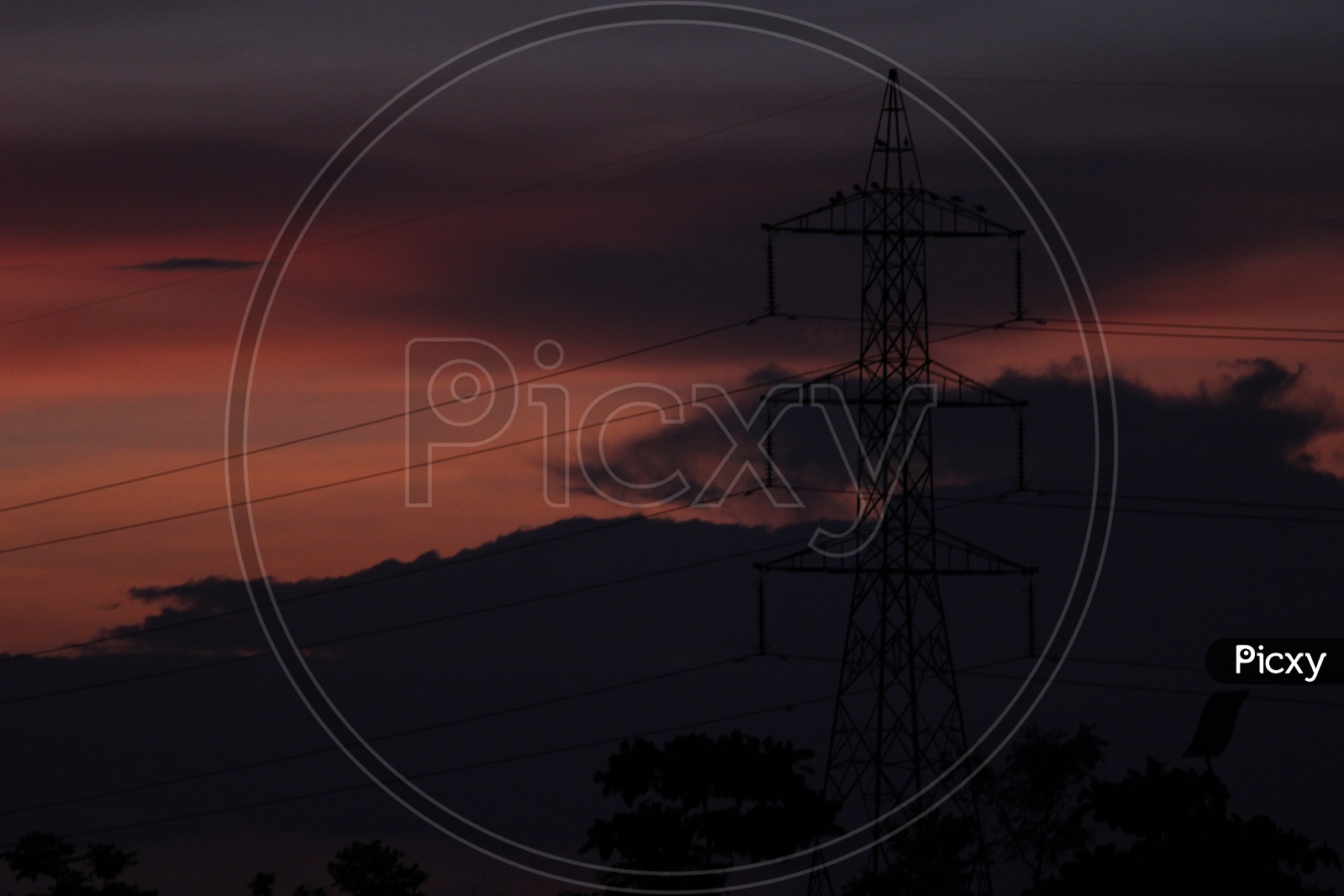 Silhouette of Electricity High tension lines With  Sunset Sky In Background