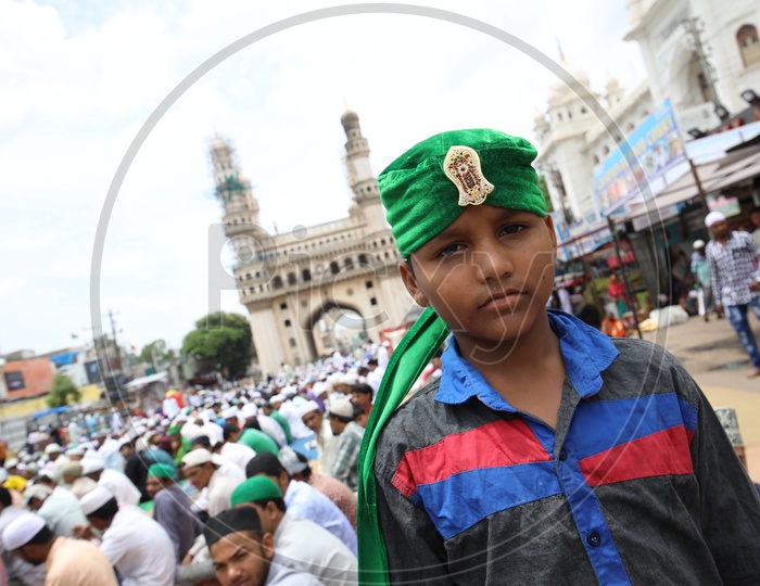 Muslim Boy Wearing Green Turban Cap  During Ramdan ramzan Prayers At  Charminar