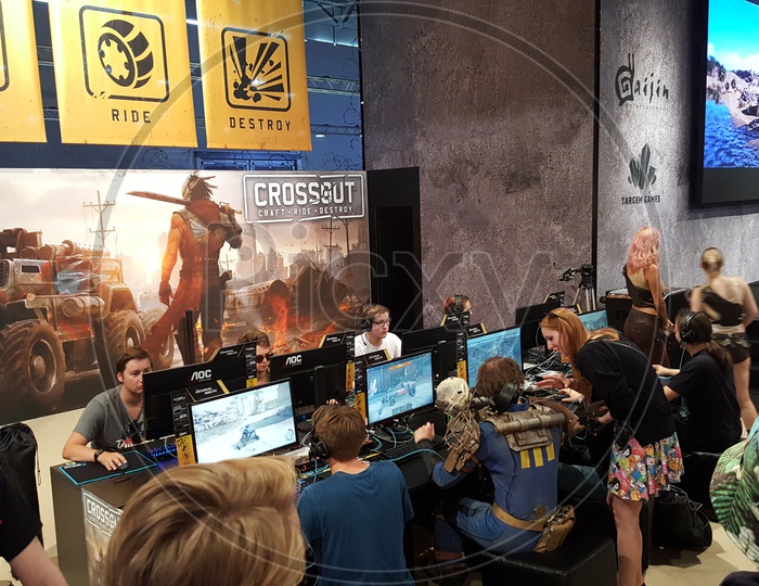 Gamer's Playing Crossout game at Gamescom, Cologne