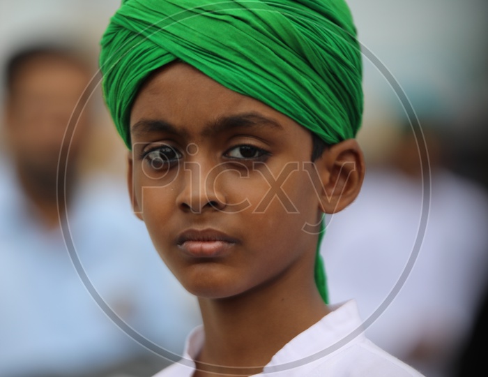 Muslim Boy  Wearing  Turban Caps With Smile Faces And Posing  During Ramzan  Ramdan Festival
