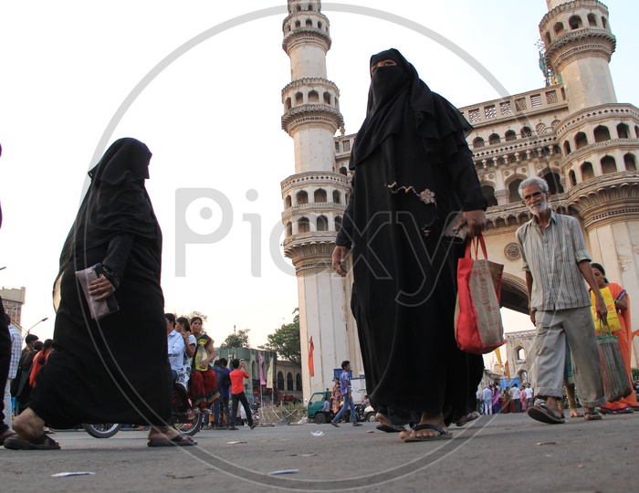 muslim women in Burqa  walking  Around The Charminar Roads