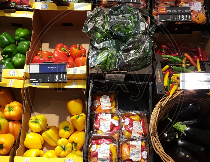 Yellow, Red and Green Color Capsicums in a Box