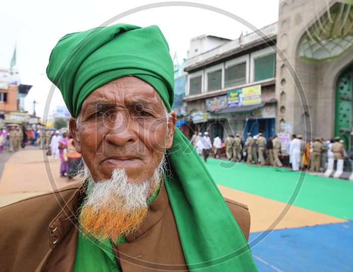 Muslim Man Wearing green Turban At Jama Masjid During  Ramzan Festival Prayers